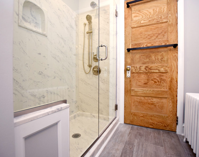 master bathroom walk in shower and towel rack