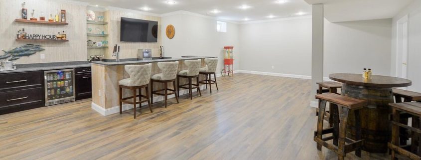 finished basement bar with recessed lighting