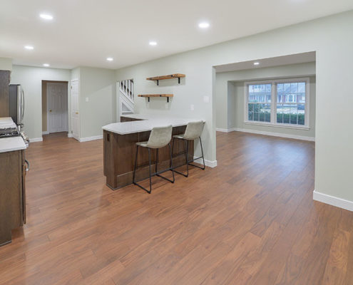 modern kitchen remodel with peninsula and open shelving