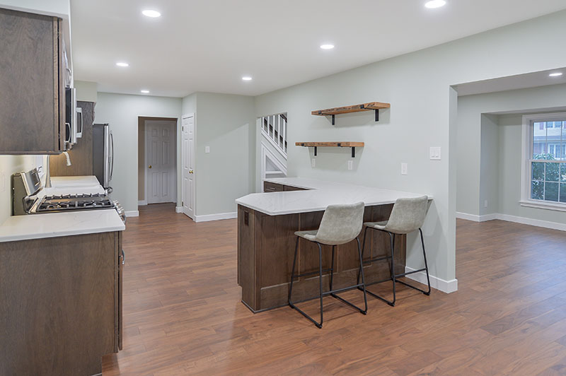 modern kitchen remodel with peninsula and open shelving