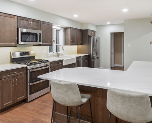 modern kitchen remodel with peninsula and open shelving