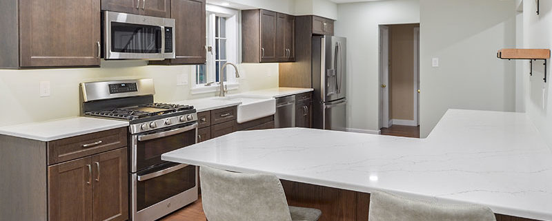 modern kitchen remodel with peninsula and open shelving