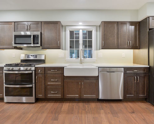 stained cabinet doors in modern kitchen remodel