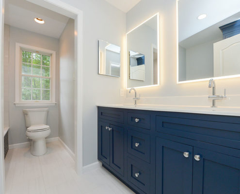 mickleton nj guest bathroom double vanity with backlit mirrors