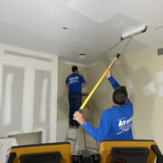 ayars interior craftsmen at work painting a room