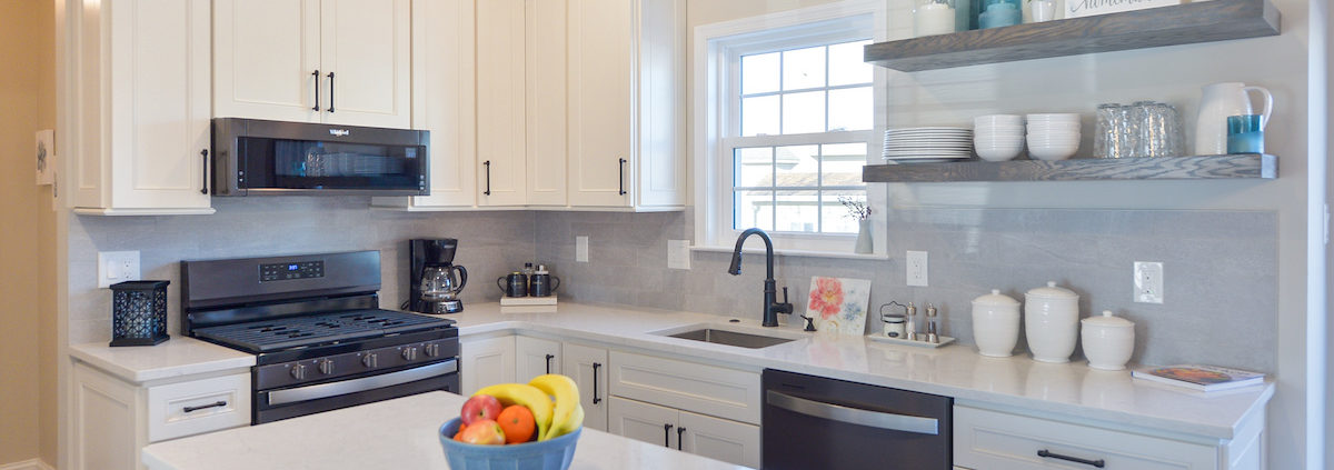 modern kitchen remodel in new jersey featuring white shaker cabinets and open shelves