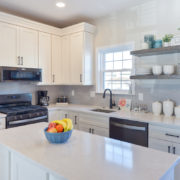 modern kitchen remodel in new jersey featuring white shaker cabinets and open shelves