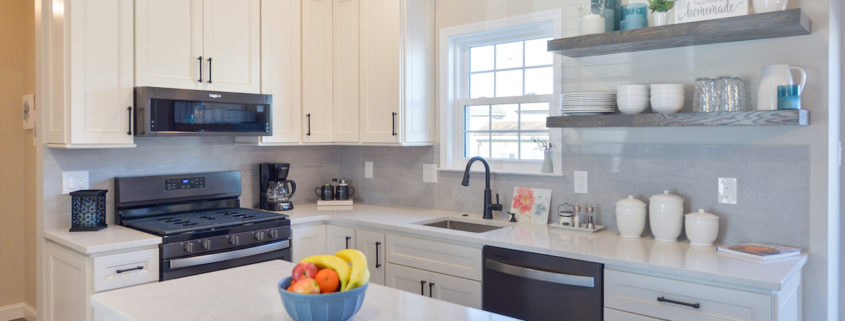 modern kitchen remodel in new jersey featuring white shaker cabinets and open shelves