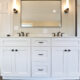 Modern master bathroom remodel, hanging mirror, white counters