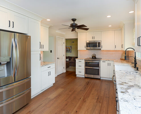 Kitchen remodel, hardwood floors, marbled countertops, stainless steel appliances, ceiling fan