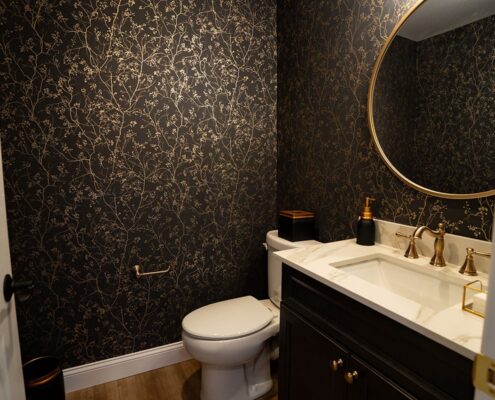 gold and green wallpapered basement half bath in sewell nj