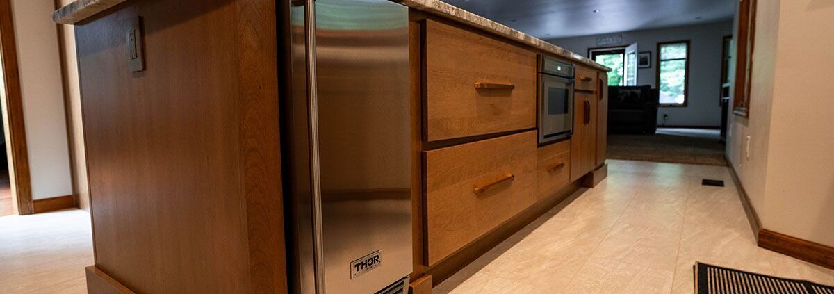 u-shaped kitchen with stained cabinets in haddon township nj