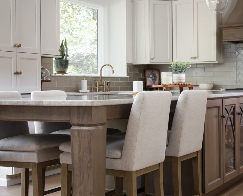 101325-kitchen-remodel-mickelton-nj-06 mickleton kitchen remodel with large marble top island and four cream colored chairs at the end