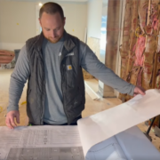 carpenter looking at blueprints ayars complete home improvements top products south jersey